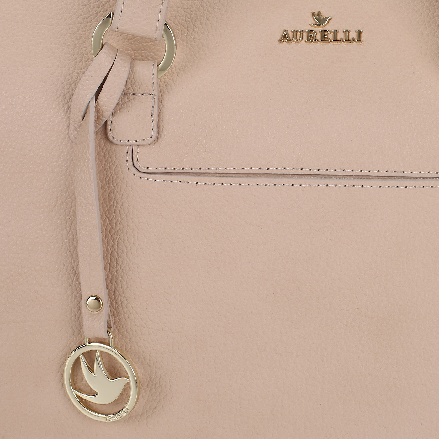 Розово-бежевая сумка с брелоком Aurelli 